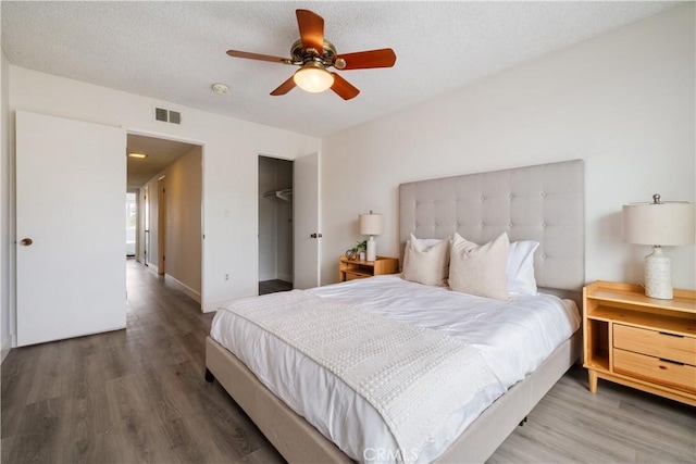 6935 Verde Ridge Rd, Rancho Palos Verdes, CA 90275 - bedroom featuring wood finished floors, ceiling fan, and a closet
