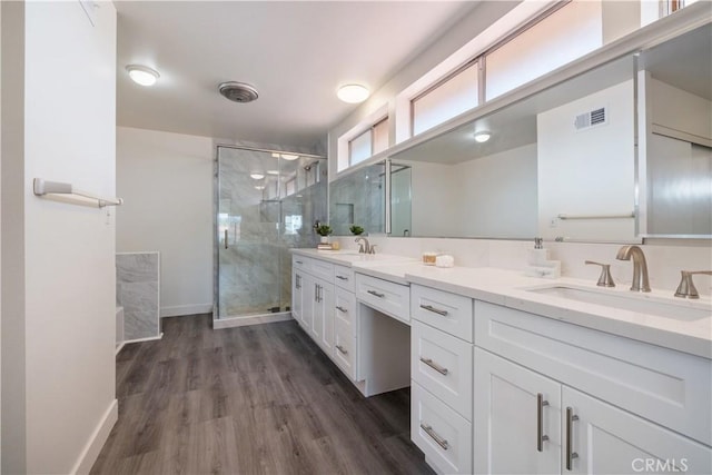 6935 Verde Ridge Rd, Rancho Palos Verdes, CA 90275 - full bathroom featuring double vanity, a stall shower, and wood finished floors