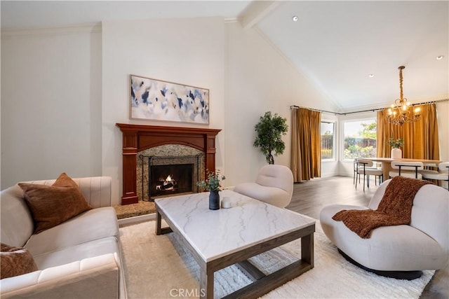6935 Verde Ridge Rd, Rancho Palos Verdes, CA 90275 - living area featuring a chandelier, light wood-style floors, beamed ceiling, a premium fireplace, and high vaulted ceiling