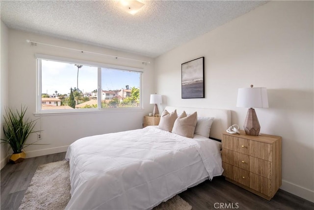 6935 Verde Ridge Rd, Rancho Palos Verdes, CA 90275 - bedroom featuring dark wood-style flooring and a textured ceiling