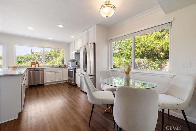 6935 Verde Ridge Rd, Rancho Palos Verdes, CA 90275 - dining space featuring ornamental molding, dark wood-style floors, and recessed lighting