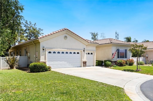 1726 Reyes Ln, Beaumont, CA 92223 - view of front of property featuring concrete driveway, an attached garage, stucco siding, and a tile roof