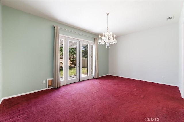 1726 Reyes Ln, Beaumont, CA 92223 - empty room featuring carpet flooring, a chandelier, and french doors