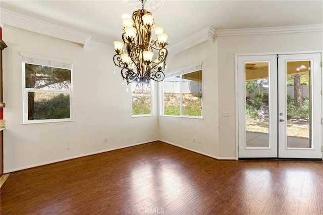 1726 Reyes Ln, Beaumont, CA 92223 - unfurnished dining area with french doors, a chandelier, healthy amount of natural light, and crown molding