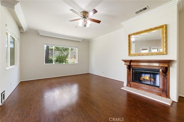 1726 Reyes Ln, Beaumont, CA 92223 - unfurnished living room with ceiling fan, wood finished floors, a tiled fireplace, and ornamental molding