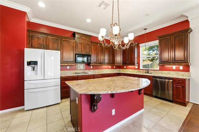 1726 Reyes Ln, Beaumont, CA 92223 - kitchen featuring stainless steel appliances, a chandelier, a center island, hanging light fixtures, and light tile patterned floors