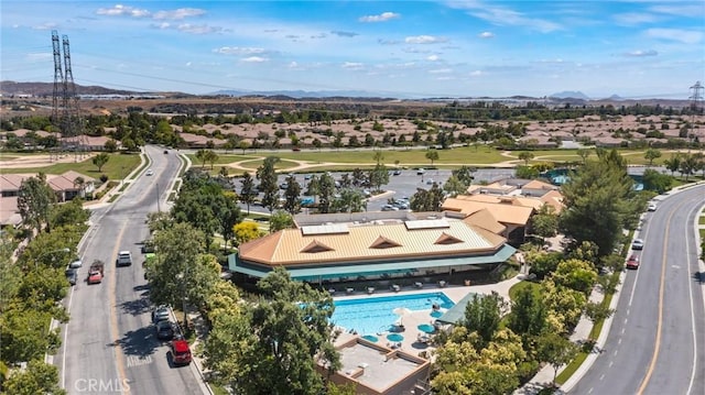1726 Reyes Ln, Beaumont, CA 92223 - aerial perspective of suburban area with a mountain backdrop and a pool area