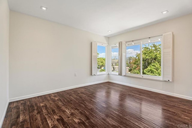 17177 Bernardo Center Dr, San Diego, CA 92128 - unfurnished room featuring dark wood-style flooring and baseboards