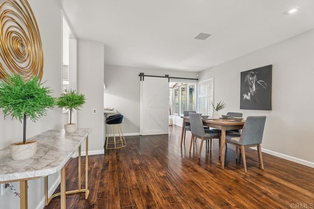 17177 Bernardo Center Dr, San Diego, CA 92128 - dining space with a barn door and wood finished floors