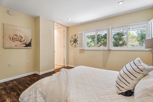 17177 Bernardo Center Dr, San Diego, CA 92128 - bedroom featuring baseboards and wood finished floors