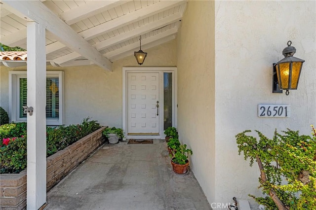 26501 Cortina Dr, Mission Viejo, CA 92691 - entrance to property featuring stucco siding and a patio area