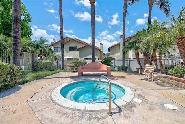 5050 Canyon Crest Dr Unit 5, Riverside, CA 92507 - view of pool with a community hot tub