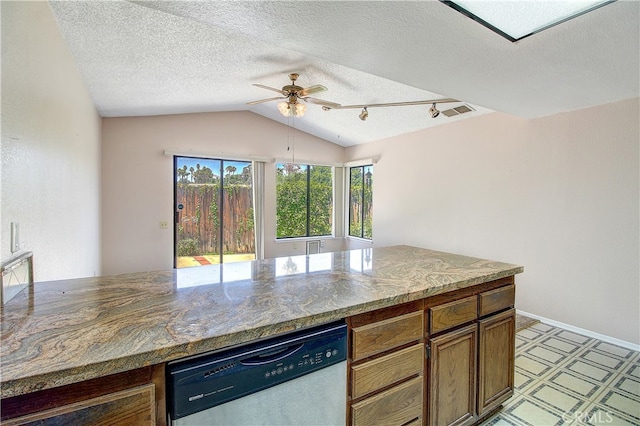 5050 Canyon Crest Dr Unit 5, Riverside, CA 92507 - kitchen featuring stainless steel dishwasher, vaulted ceiling, light flooring, ceiling fan, and brown cabinets