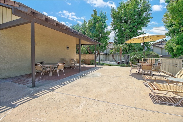5050 Canyon Crest Dr Unit 5, Riverside, CA 92507 - view of patio / terrace featuring outdoor dining space