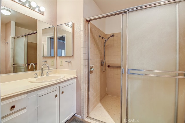 5050 Canyon Crest Dr Unit 5, Riverside, CA 92507 - full bathroom featuring a stall shower and vanity