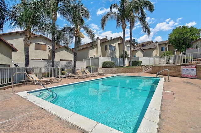 5050 Canyon Crest Dr Unit 5, Riverside, CA 92507 - community pool with a residential view and a patio