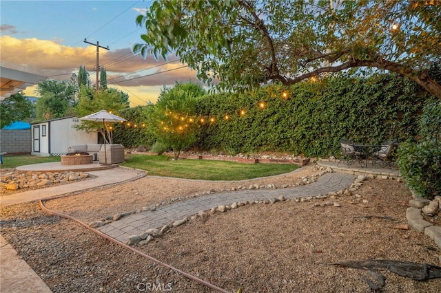 2240 La Sierra Way, Claremont, CA 91711 - view of green lawn with a patio, an outdoor structure, and an outdoor living space with a fire pit