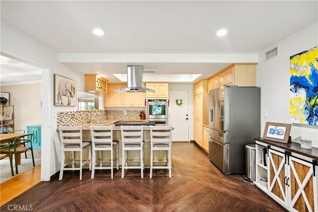 2240 La Sierra Way, Claremont, CA 91711 - kitchen featuring appliances with stainless steel finishes, extractor fan, a peninsula, light brown cabinetry, and decorative backsplash
