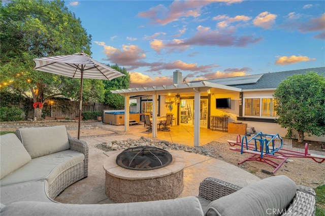 2240 La Sierra Way, Claremont, CA 91711 - fenced backyard with a hot tub, a patio, and an outdoor living space with a fire pit