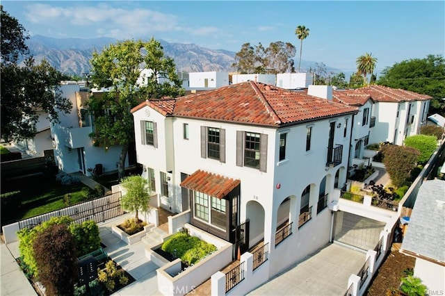 118 N Allen Ave Unit 2, Pasadena, CA 91106 - back of house featuring a mountain view, stucco siding, a tiled roof, and a residential view