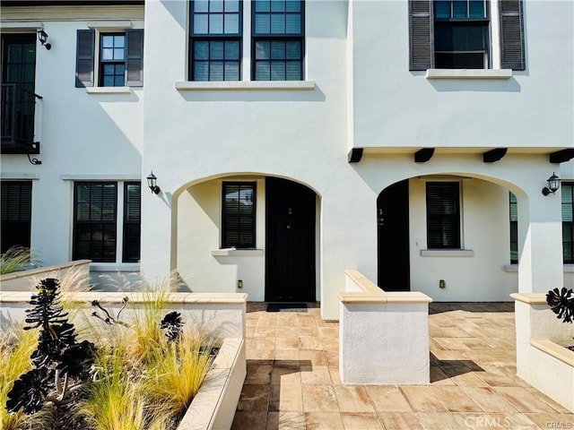 118 N Allen Ave Unit 2, Pasadena, CA 91106 - view of front of house with stucco siding and a patio