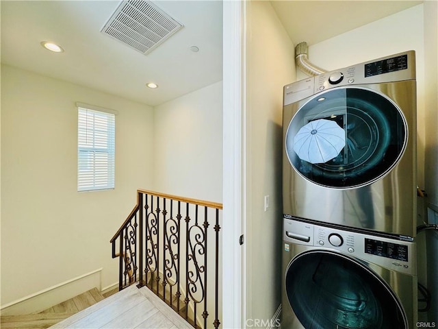 118 N Allen Ave Unit 2, Pasadena, CA 91106 - laundry area featuring stacked washing machine and dryer, recessed lighting, and wood finished floors