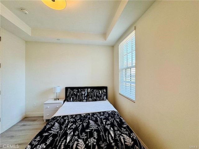118 N Allen Ave Unit 2, Pasadena, CA 91106 - bedroom with light wood-style floors and a raised ceiling