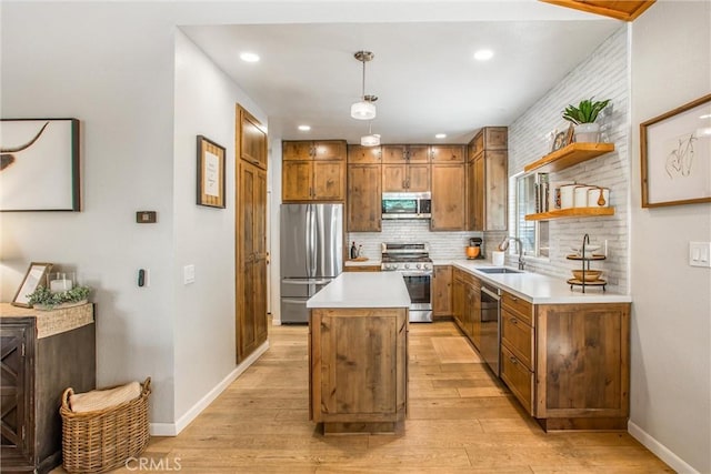 32425 Snowshoe Ln, Running Springs, CA 92382 - kitchen with stainless steel appliances, brown cabinetry, light wood-type flooring, light countertops, and recessed lighting