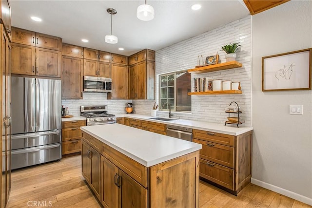 32425 Snowshoe Ln, Running Springs, CA 92382 - kitchen featuring appliances with stainless steel finishes, decorative backsplash, light wood-style flooring, brown cabinets, and recessed lighting