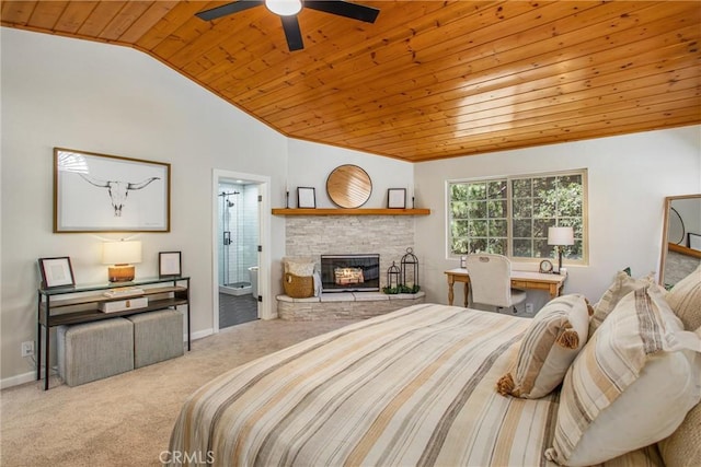 32425 Snowshoe Ln, Running Springs, CA 92382 - carpeted bedroom featuring wood ceiling, vaulted ceiling, a stone fireplace, and ensuite bath