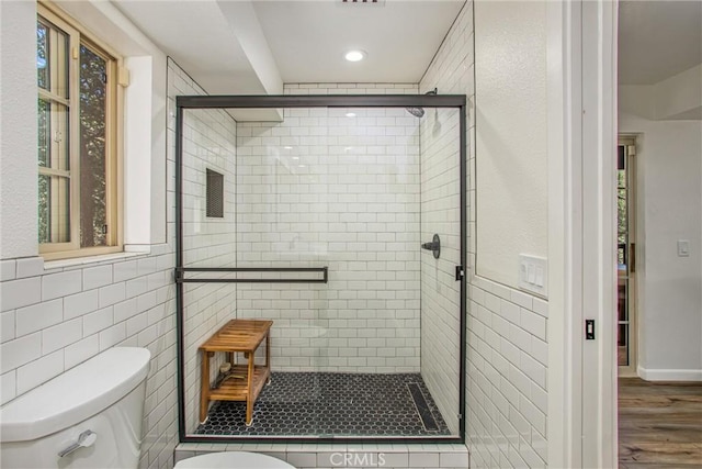 32425 Snowshoe Ln, Running Springs, CA 92382 - bathroom with a stall shower, healthy amount of natural light, wood finished floors, and recessed lighting