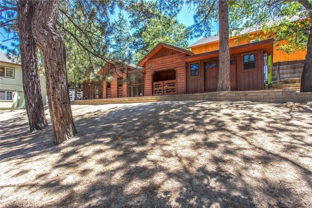 32425 Snowshoe Ln, Running Springs, CA 92382 - view of front of house featuring a garage