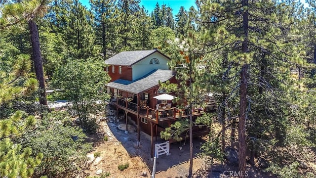 32425 Snowshoe Ln, Running Springs, CA 92382 - view of subject property with a heavily wooded area
