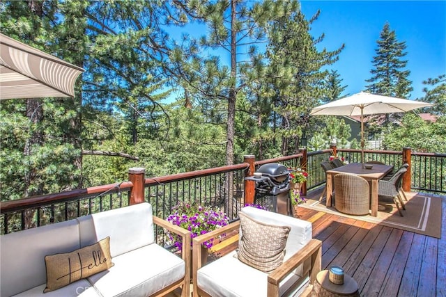 32425 Snowshoe Ln, Running Springs, CA 92382 - deck with outdoor dining space, an outdoor hangout area, and a grill