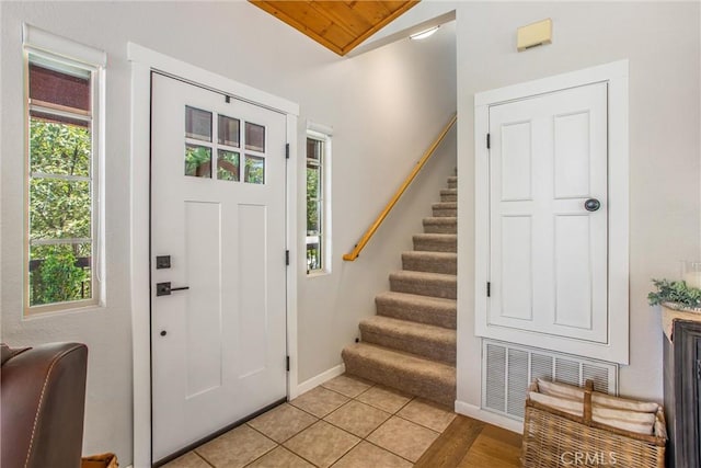 32425 Snowshoe Ln, Running Springs, CA 92382 - entryway with stairway and vaulted ceiling