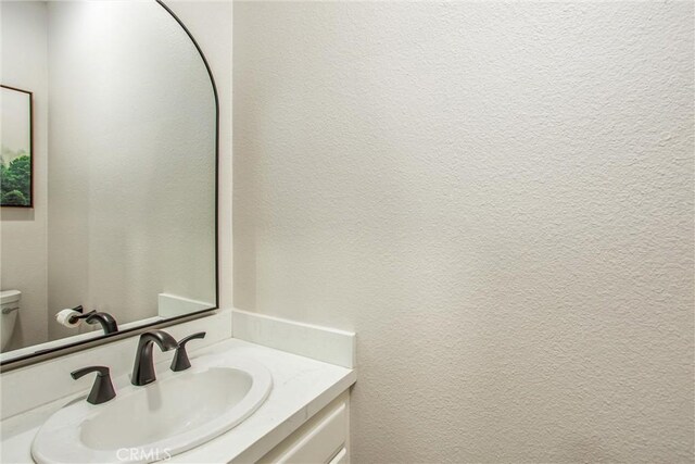 32425 Snowshoe Ln, Running Springs, CA 92382 - bathroom with toilet and vanity