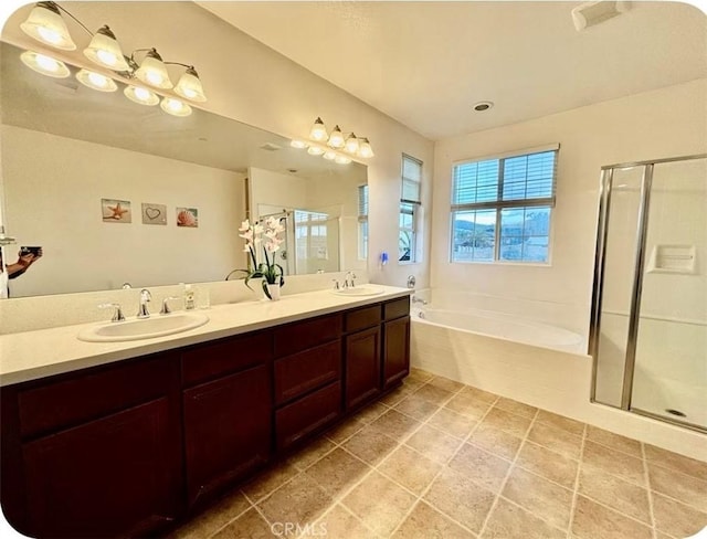 12639 Spruce Hill Rd, Moreno Valley, CA 92555 - full bathroom with a garden tub, a shower stall, double vanity, and tile patterned floors