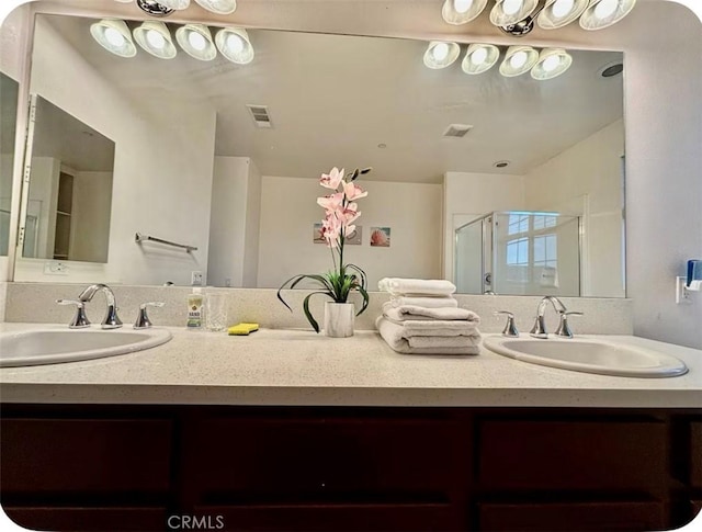 12639 Spruce Hill Rd, Moreno Valley, CA 92555 - full bathroom featuring double vanity and a stall shower