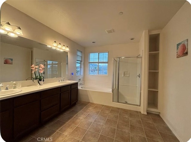12639 Spruce Hill Rd, Moreno Valley, CA 92555 - full bathroom with a garden tub, double vanity, a stall shower, and tile patterned floors