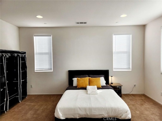 12639 Spruce Hill Rd, Moreno Valley, CA 92555 - bedroom with carpet floors, multiple windows, and recessed lighting