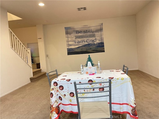 12639 Spruce Hill Rd, Moreno Valley, CA 92555 - carpeted dining space with stairway and recessed lighting