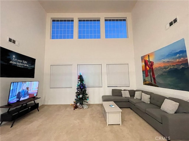 12639 Spruce Hill Rd, Moreno Valley, CA 92555 - carpeted living area with a high ceiling