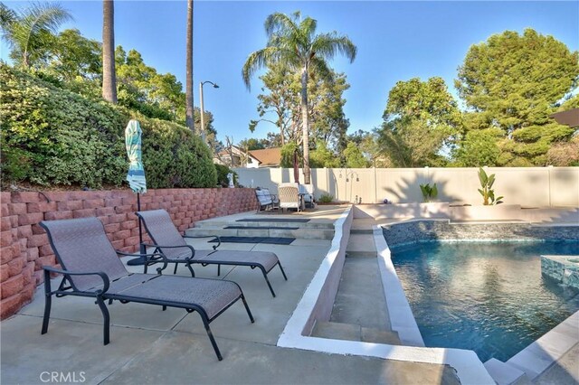 29862 Via Puesta Del Sol, Temecula, CA 92591 - view of pool featuring a fenced backyard and a patio area