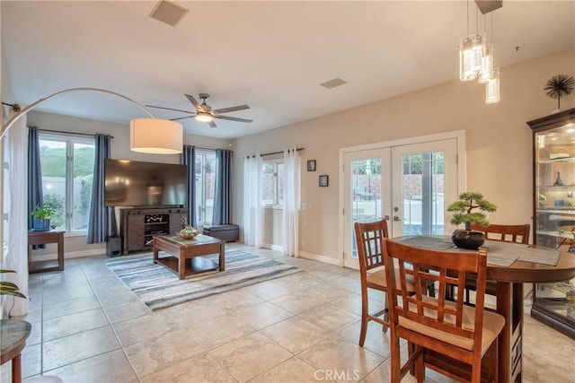 29862 Via Puesta Del Sol, Temecula, CA 92591 - dining space featuring french doors, ceiling fan, and light tile patterned floors