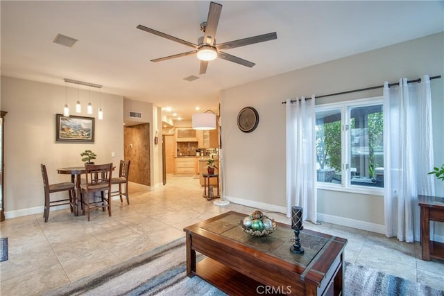 29862 Via Puesta Del Sol, Temecula, CA 92591 - living area with ceiling fan and light tile patterned floors