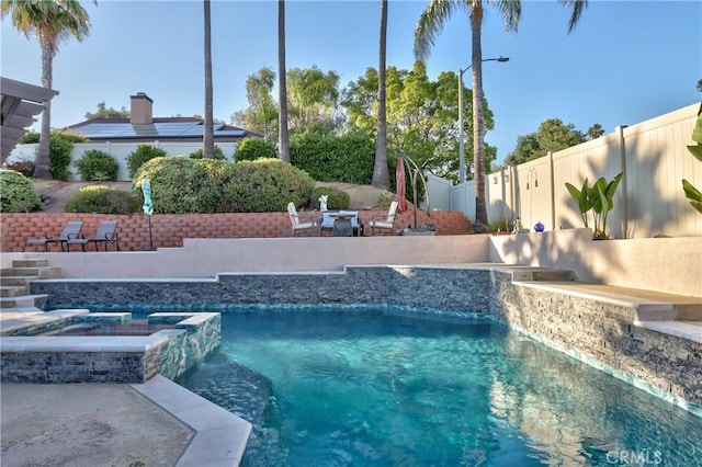 29862 Via Puesta Del Sol, Temecula, CA 92591 - view of pool featuring a fenced backyard, a pool with connected hot tub, and a patio