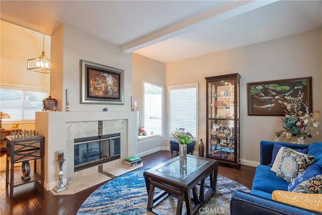 29862 Via Puesta Del Sol, Temecula, CA 92591 - living area with plenty of natural light, a tile fireplace, a chandelier, and wood finished floors