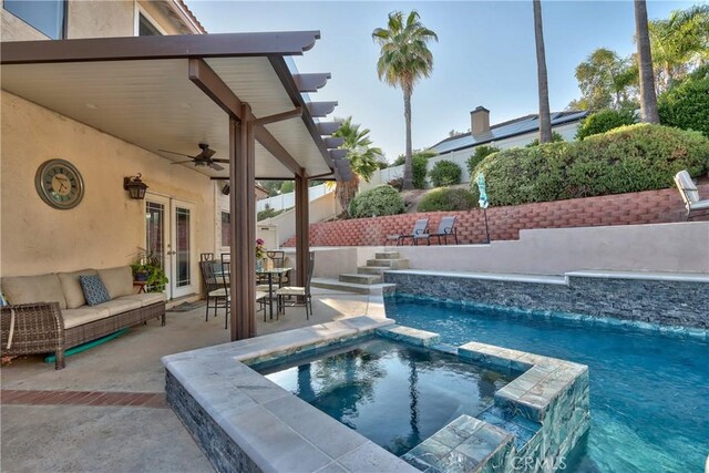 29862 Via Puesta Del Sol, Temecula, CA 92591 - view of swimming pool with french doors, ceiling fan, a pool with connected hot tub, a patio, and outdoor lounge area