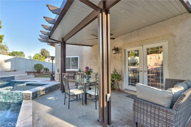 29862 Via Puesta Del Sol, Temecula, CA 92591 - fenced backyard with a patio area, outdoor dining space, french doors, and a pool with connected hot tub