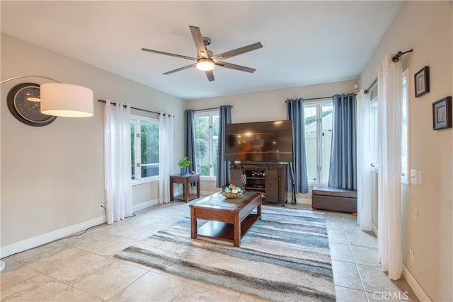 29862 Via Puesta Del Sol, Temecula, CA 92591 - living area featuring a ceiling fan, plenty of natural light, and tile patterned floors